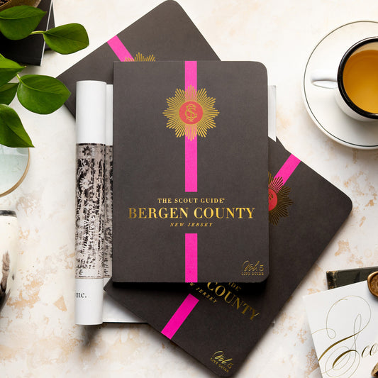 The Scout Guide Bergen County Volume 5, black cover with hot pink stripe, gold foil title and TSG Medallion logo