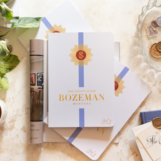 The Scout Guide Bozeman Volume 3, cream cover with purple stripe, gold foil title and TSG Medallion logo