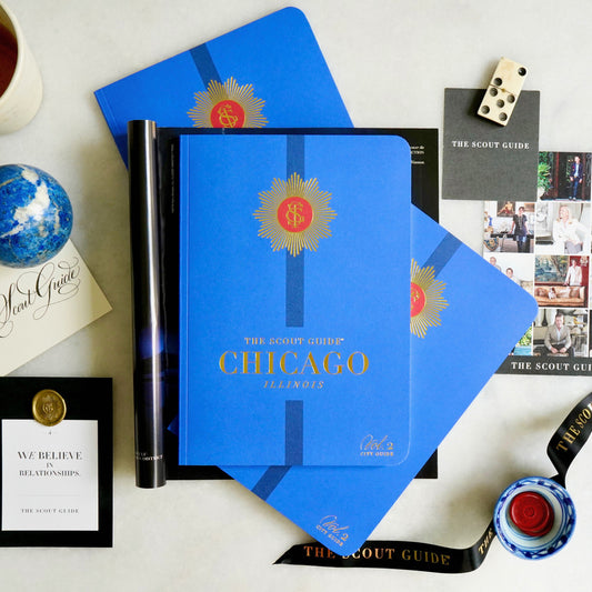 The Scout Guide Chicago Volume 2, light blue cover with deep blue  stripe, gold foil title and TSG Medallion logo