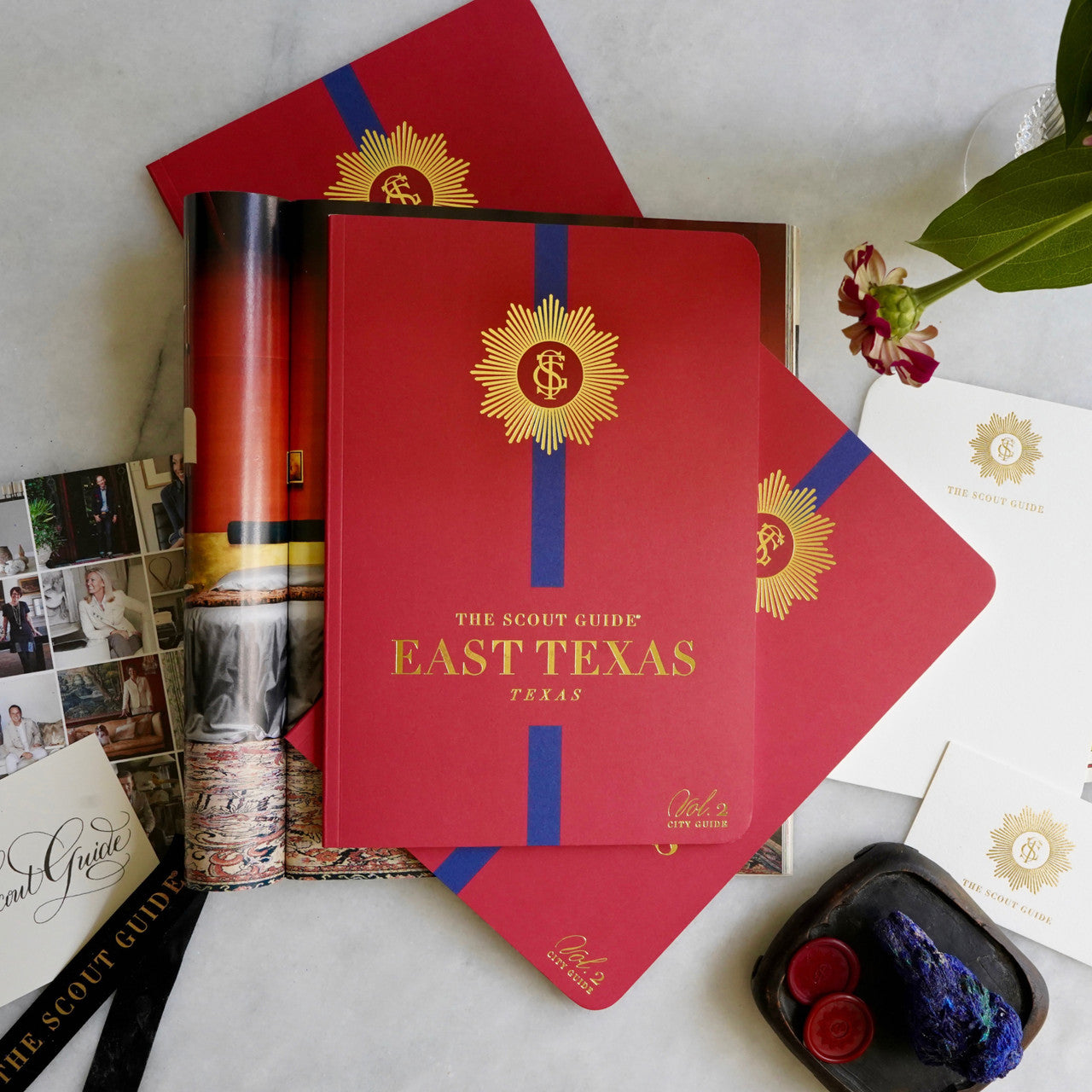 The Scout Guide East Texas Volume 2, red cover with blue  stripe, gold foil title and TSG Medallion logo