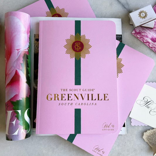 The Scout Guide Greenville Volume 9, light pink cover with dark green stripe, gold foil title and TSG Medallion logo