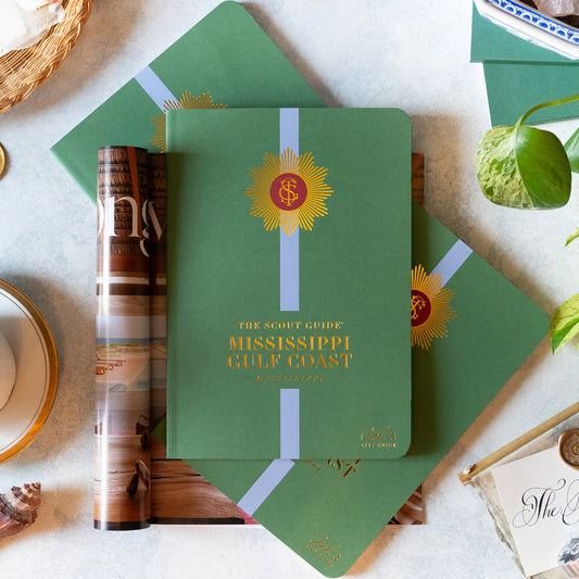 The Scout Guide Mississippi Gulf Coast Volume 3, Dark Kelly Green cover with light blue stripe, gold foil title and TSG Medallion logo