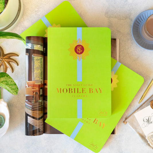 The Scout Guide Mobile Bay Volume 8, lime green cover with blue stripe, gold foil title and TSG Medallion logo