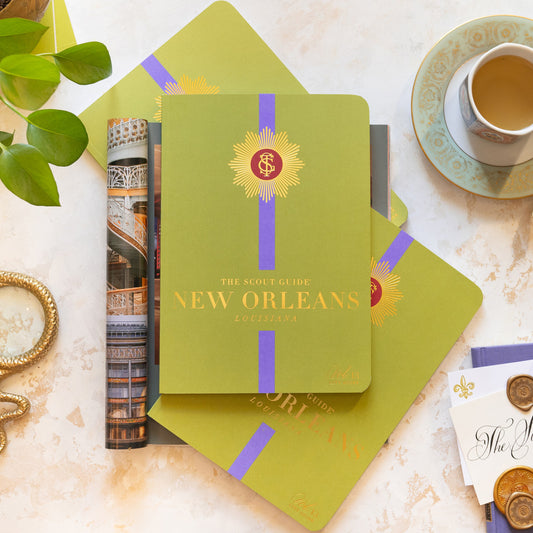 The Scout Guide New Orleans Volume 13, green cover with purple stripe, gold foil title and TSG Medallion logo