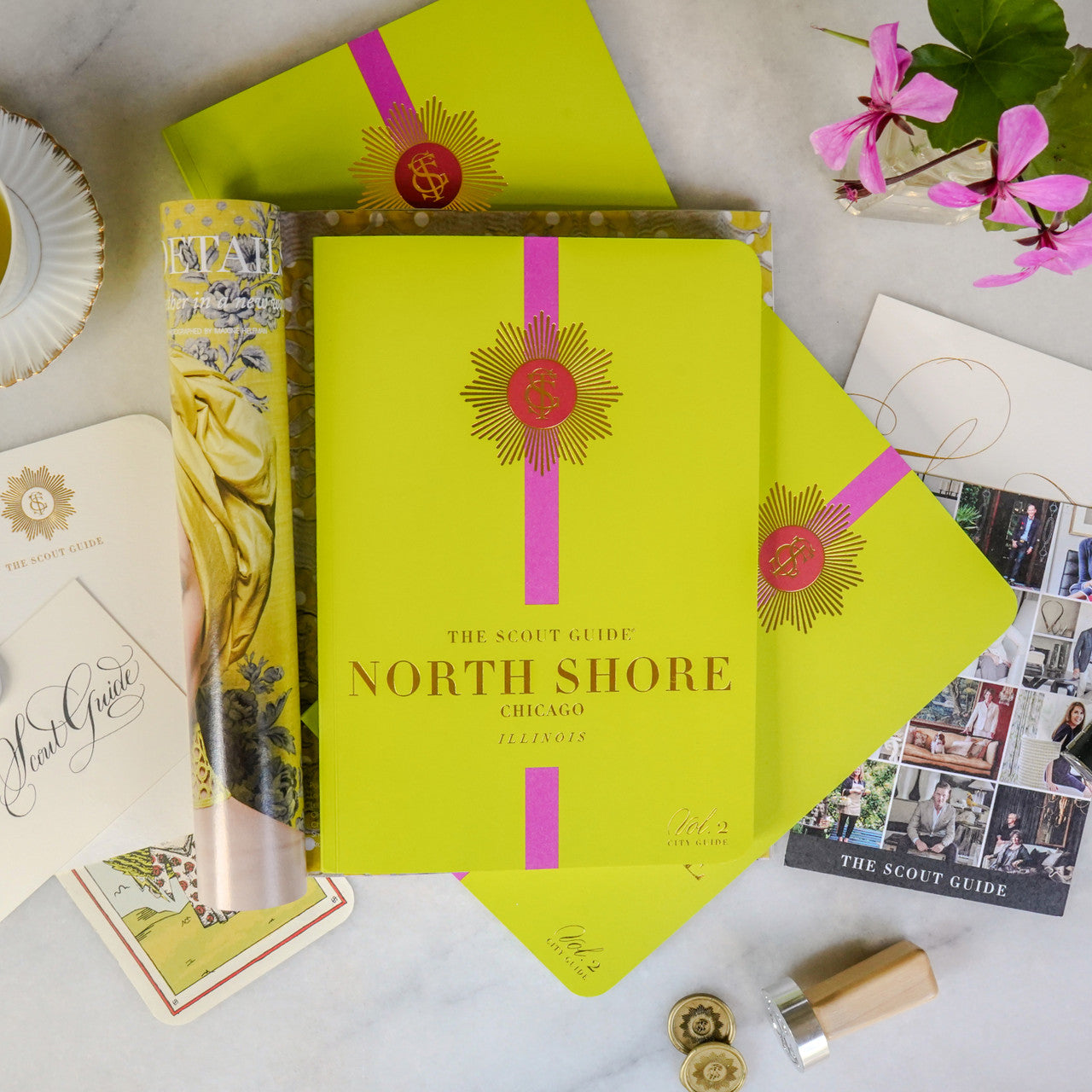 The Scout Guide North Shore Chicago Volume 2, greenish yellow cover with pink stripe, gold foil title and TSG Medallion logo