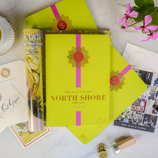The Scout Guide North Shore Chicago Volume 2, greenish yellow cover with pink stripe, gold foil title and TSG Medallion logo