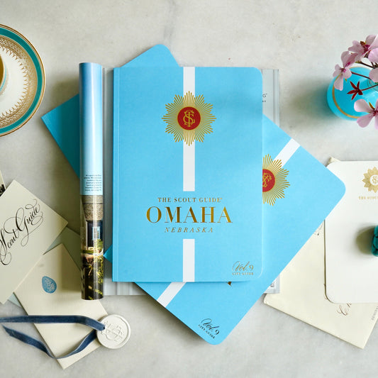 The Scout Guide Omaha Volume 9, aqua cover with white stripe, gold foil title and TSG Medallion logo