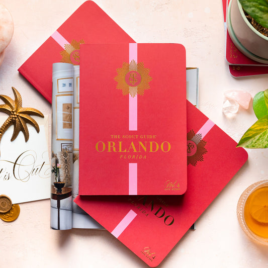 The Scout Guide Orlando Volume 4, red cover with pink stripe, gold foil title and TSG Medallion logo