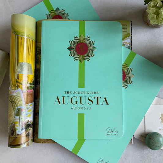 The Scout Guide Augusta Volume 6, teal blue cover with green stripe, gold foil title and TSG Medallion logo