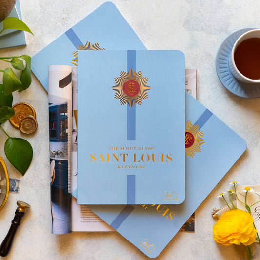 The Scout Guide Saint Louis Volume 7, light blue cover with dark blue stripe, gold foil title and TSG Medallion logo