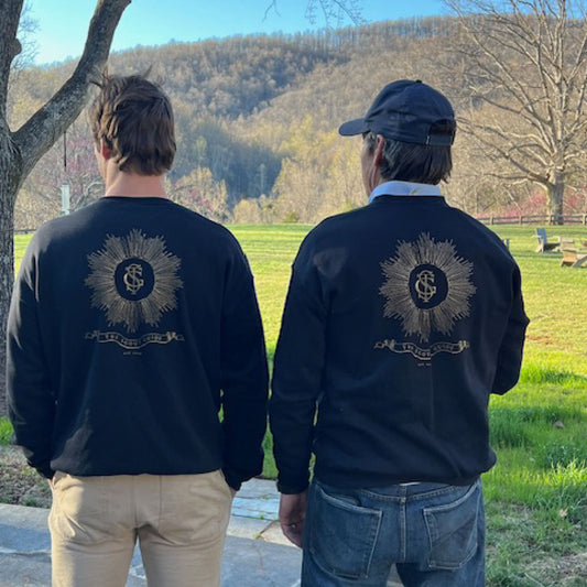 The Scout Guide crewneck in navy, back